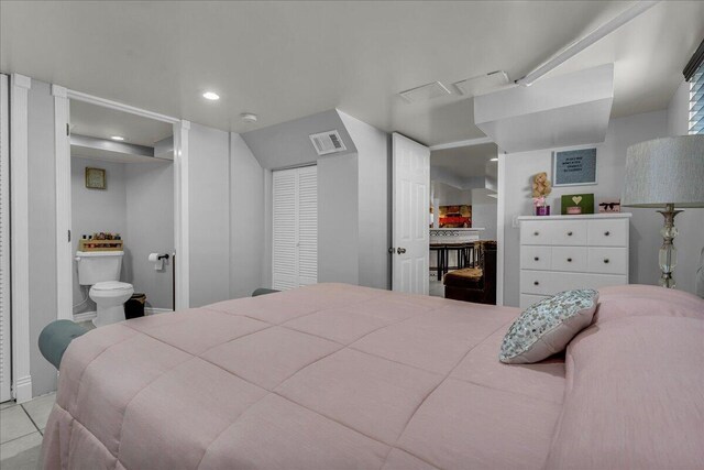bedroom featuring recessed lighting and tile patterned floors