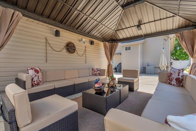 view of patio / terrace with a gazebo and an outdoor hangout area