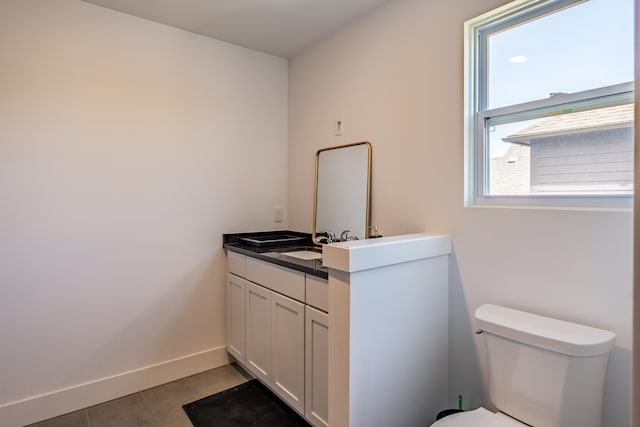 54598 Deadwood Ln, Utica, MI 48316 - half bathroom featuring toilet, vanity, and baseboards