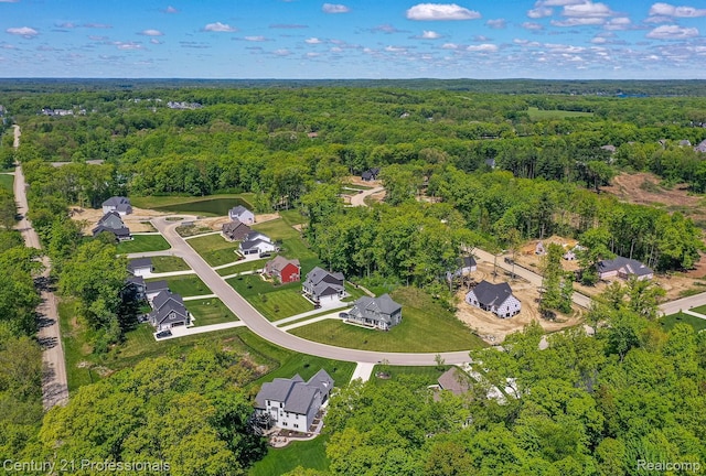 9058 Fielding Dr, Brighton, MI 48116 - aerial view of property and surrounding area with a forest and nearby suburban area