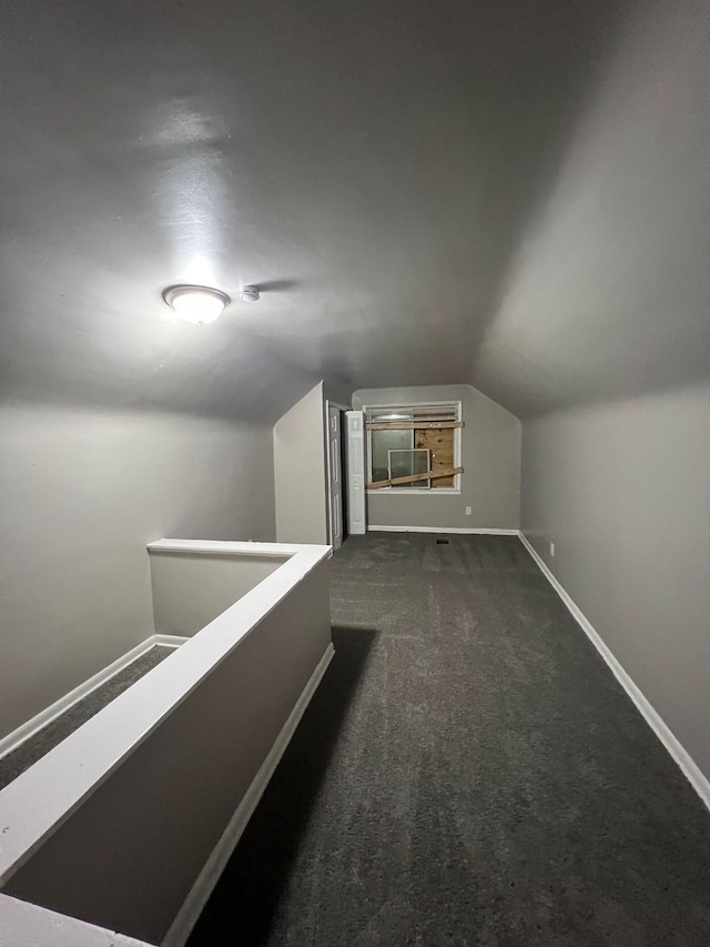 14903 Woodmont Ave, Detroit, MI 48227 - additional living space with lofted ceiling, carpet, and baseboards