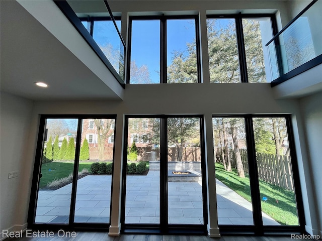 145 Westchester Way, Birmingham, MI 48009 - doorway to outside with a high ceiling and recessed lighting