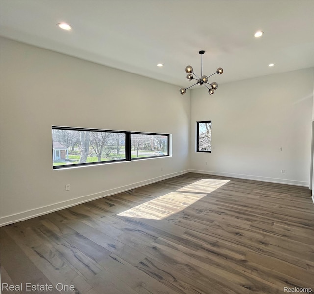 145 Westchester Way, Birmingham, MI 48009 - spare room with a chandelier, plenty of natural light, recessed lighting, and baseboards