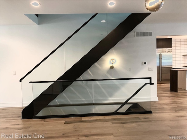 145 Westchester Way, Birmingham, MI 48009 - staircase with baseboards, wood finished floors, and recessed lighting