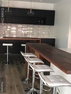 145 Westchester Way, Birmingham, MI 48009 - bar featuring wood finished floors