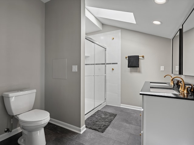 270 S Center St, Northville, MI 48167 - full bath with a skylight, baseboards, toilet, a shower stall, and recessed lighting