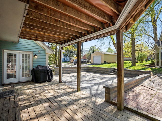270 S Center St, Northville, MI 48167 - wooden terrace with french doors, grilling area, and an outbuilding