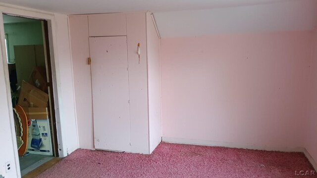 1730 Round Lake Hwy, Manitou Beach, MI 49253 - unfurnished bedroom featuring carpet