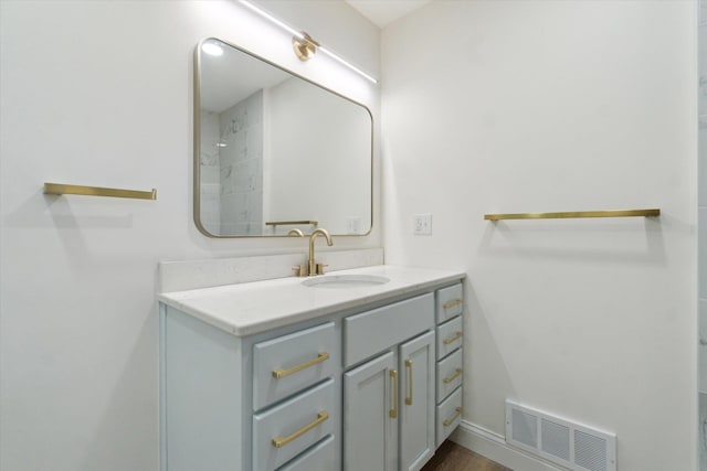 1431 E Oliver St, Owosso, MI 48867 - bathroom featuring vanity and baseboards