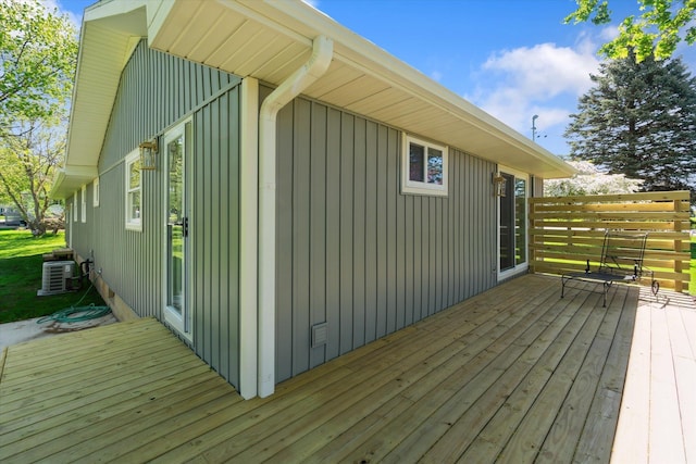 1431 E Oliver St, Owosso, MI 48867 - wooden terrace with central air condition unit