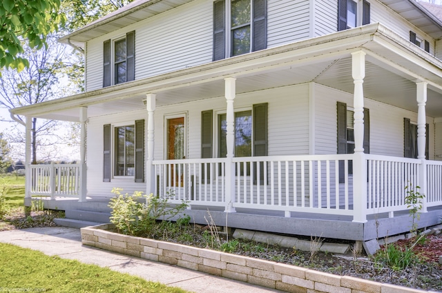 view of property exterior featuring covered porch