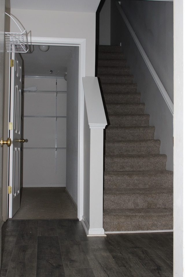 414 Old Pine Way Unit 136, Walled Lake, MI 48390 - stairway with wood finished floors and baseboards