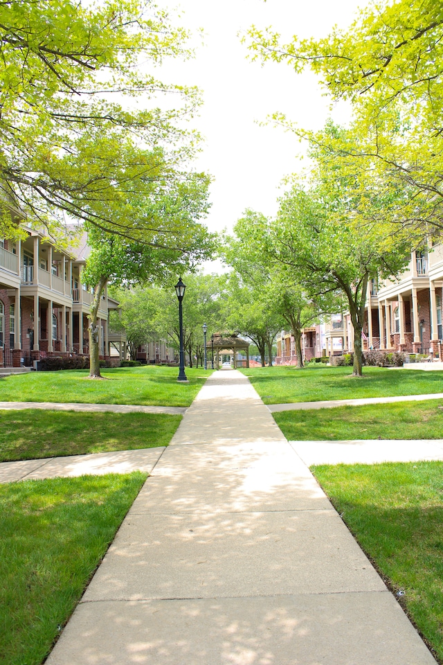 414 Old Pine Way Unit 136, Walled Lake, MI 48390 - view of property's community featuring a yard