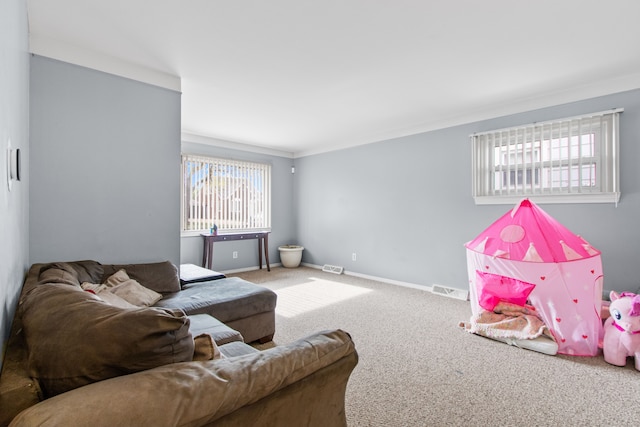 carpeted living room featuring plenty of natural light and baseboards