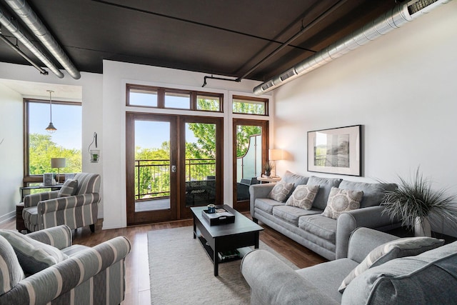 12 Washington Ave Unit 8, Grand Haven, MI 49417 - living area featuring wood finished floors and french doors