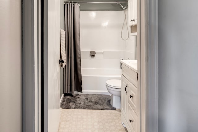 132 Jerome Ave, Ypsilanti, MI 48198 - bathroom featuring toilet, vanity, and shower / bath combo with shower curtain
