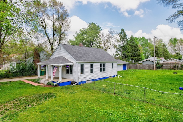 132 Jerome Ave, Ypsilanti, MI 48198 - back of house with a chimney and roof with shingles