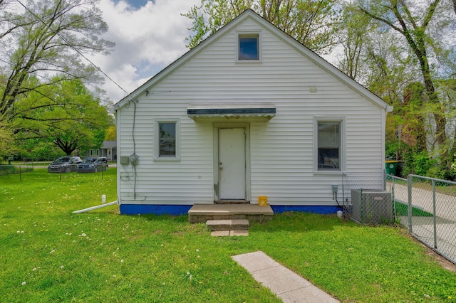 132 Jerome Ave, Ypsilanti, MI 48198 - rear view of property with central air condition unit