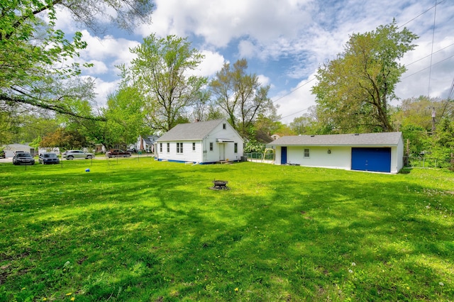 132 Jerome Ave, Ypsilanti, MI 48198 - view of yard with an outdoor fire pit