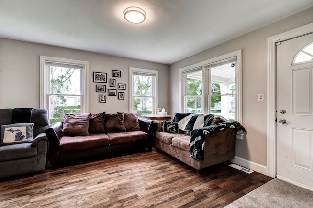 132 Jerome Ave, Ypsilanti, MI 48198 - living area featuring dark wood-style flooring and baseboards
