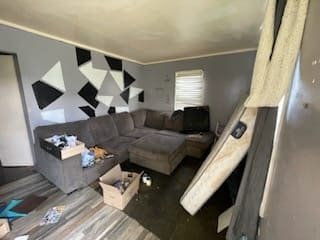 18547 Mccormick St, Detroit, MI 48224 - living room featuring crown molding