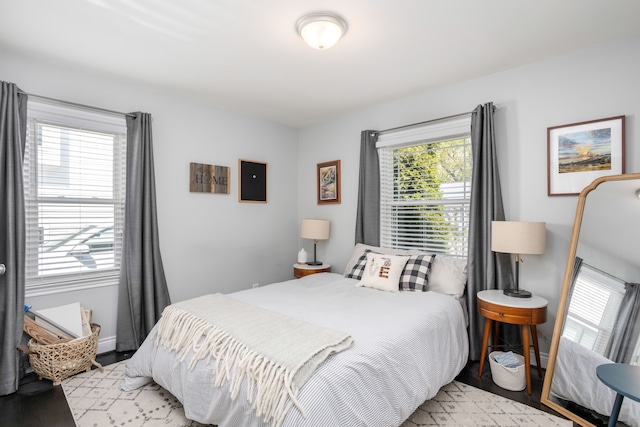 bedroom with light wood-style floors