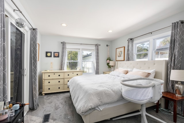 carpeted bedroom featuring recessed lighting