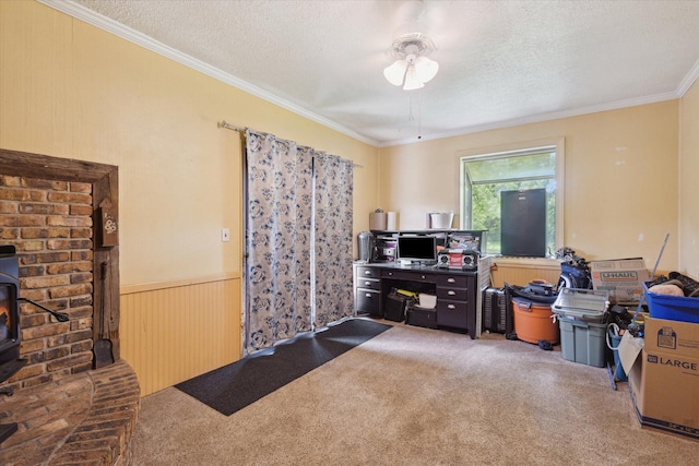2726 Horton Ct, Niles, MI 49120 - carpeted office space with a wood stove, ornamental molding, a textured ceiling, a ceiling fan, and wainscoting
