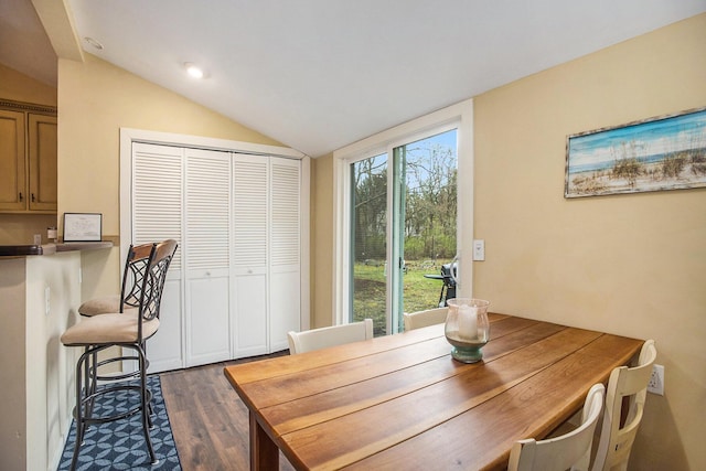 6280 Gleason Rd, Saugatuck, MI 49453 - dining room featuring lofted ceiling, dark wood-type flooring, and recessed lighting