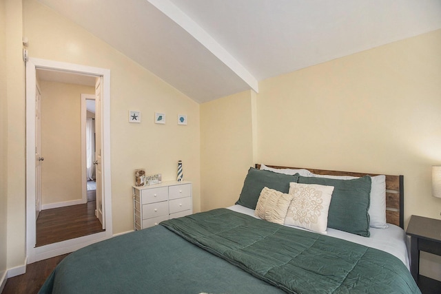 6280 Gleason Rd, Saugatuck, MI 49453 - bedroom featuring vaulted ceiling, wood finished floors, and baseboards