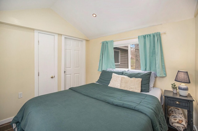 6280 Gleason Rd, Saugatuck, MI 49453 - bedroom featuring lofted ceiling