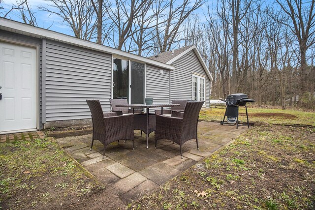 6280 Gleason Rd, Saugatuck, MI 49453 - view of patio with grilling area and outdoor dining space