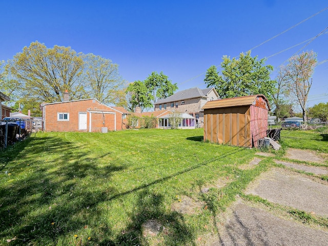 8320 Nightingale St, Dearborn Heights, MI 48127 - view of yard featuring a shed and an outbuilding