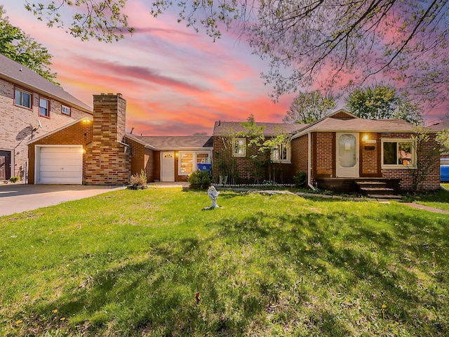 8320 Nightingale St, Dearborn Heights, MI 48127 - ranch-style home featuring concrete driveway, a yard, a chimney, brick siding, and a garage