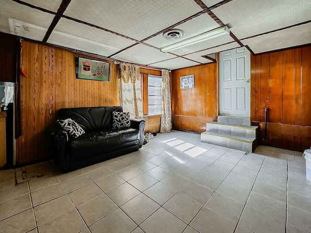 8320 Nightingale St, Dearborn Heights, MI 48127 - living area featuring wooden walls and tile patterned flooring