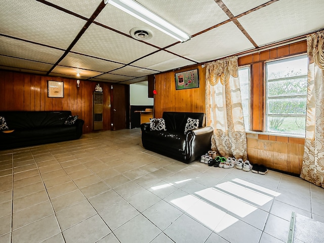 8320 Nightingale St, Dearborn Heights, MI 48127 - living room featuring wooden walls and light tile patterned floors