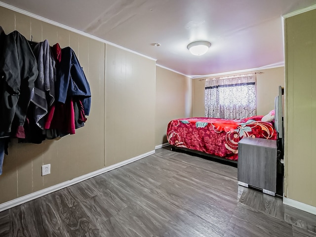 8320 Nightingale St, Dearborn Heights, MI 48127 - bedroom with crown molding, wood finished floors, and baseboards