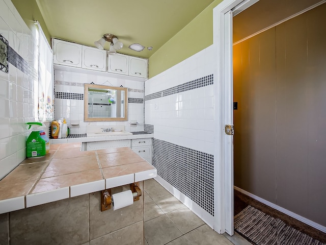 8320 Nightingale St, Dearborn Heights, MI 48127 - bathroom featuring tile patterned flooring, vanity, and tasteful backsplash