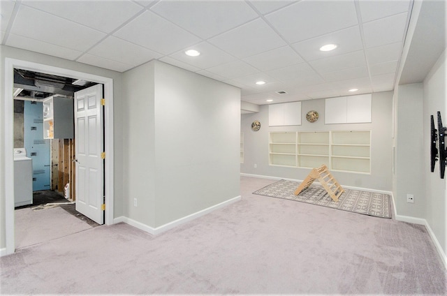 rec room featuring carpet flooring, baseboards, recessed lighting, a paneled ceiling, and washer / dryer