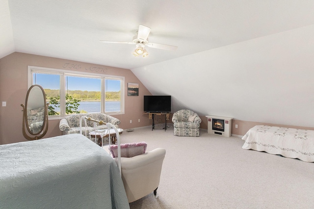 9458 Edwin Markham Rd, Brooklyn, MI 49230 - carpeted bedroom with vaulted ceiling, a ceiling fan, and baseboards
