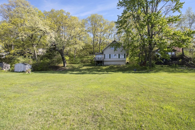 9458 Edwin Markham Rd, Brooklyn, MI 49230 - view of grassy yard with a shed and an outdoor structure