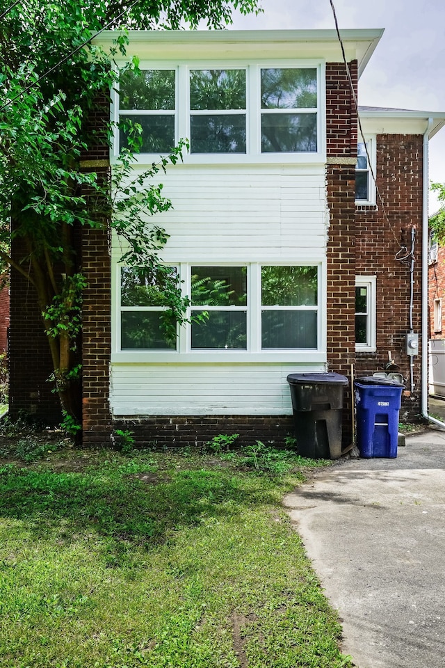 17344 Wisconsin St, Detroit, MI 48221 - view of property exterior with a yard
