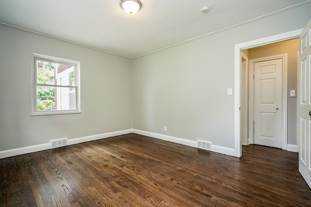 17344 Wisconsin St, Detroit, MI 48221 - empty room with baseboards and dark wood-type flooring