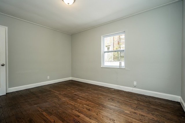 17344 Wisconsin St, Detroit, MI 48221 - unfurnished room featuring dark wood-type flooring, baseboards, and ornamental molding