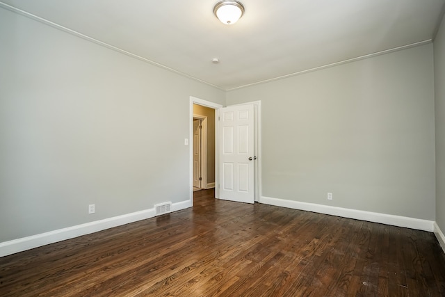 17344 Wisconsin St, Detroit, MI 48221 - unfurnished room featuring baseboards and dark wood-style floors
