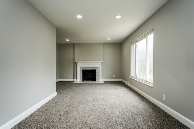 17344 Wisconsin St, Detroit, MI 48221 - unfurnished living room with recessed lighting, carpet floors, baseboards, and a fireplace
