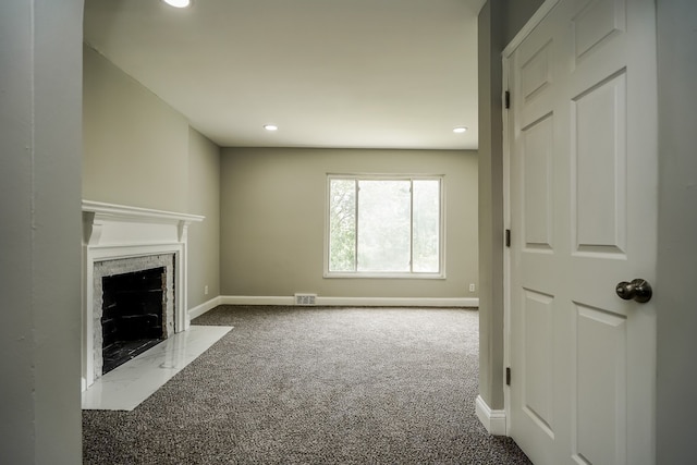 17344 Wisconsin St, Detroit, MI 48221 - unfurnished living room with carpet, baseboards, recessed lighting, and a high end fireplace