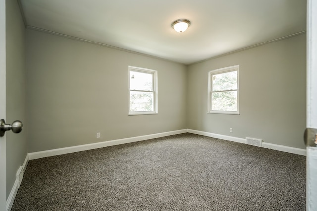 17344 Wisconsin St, Detroit, MI 48221 - carpeted spare room featuring ornamental molding and baseboards