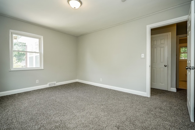 17344 Wisconsin St, Detroit, MI 48221 - spare room featuring carpet flooring, baseboards, and crown molding