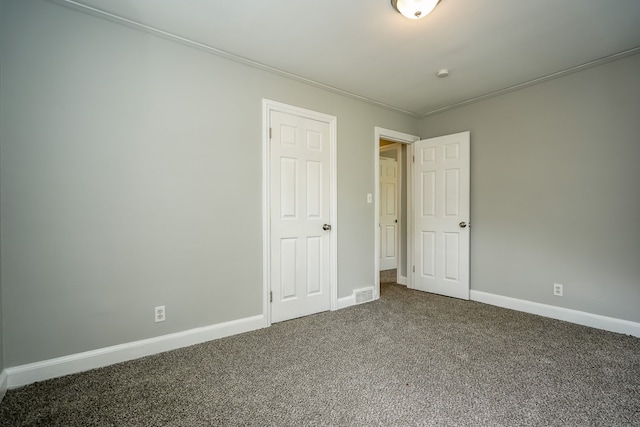 17344 Wisconsin St, Detroit, MI 48221 - unfurnished bedroom featuring carpet flooring, baseboards, and crown molding